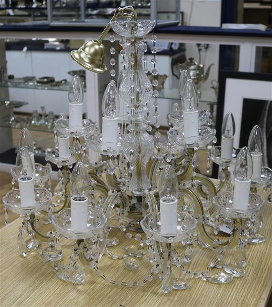 A 20th century cut and moulded glass chandelier, with beaded drops diameter 63cm drop 48cm